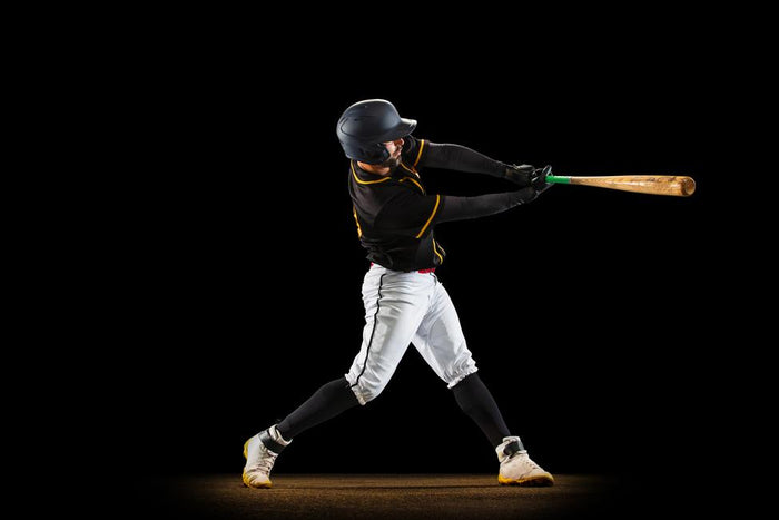 A batter mid-swing